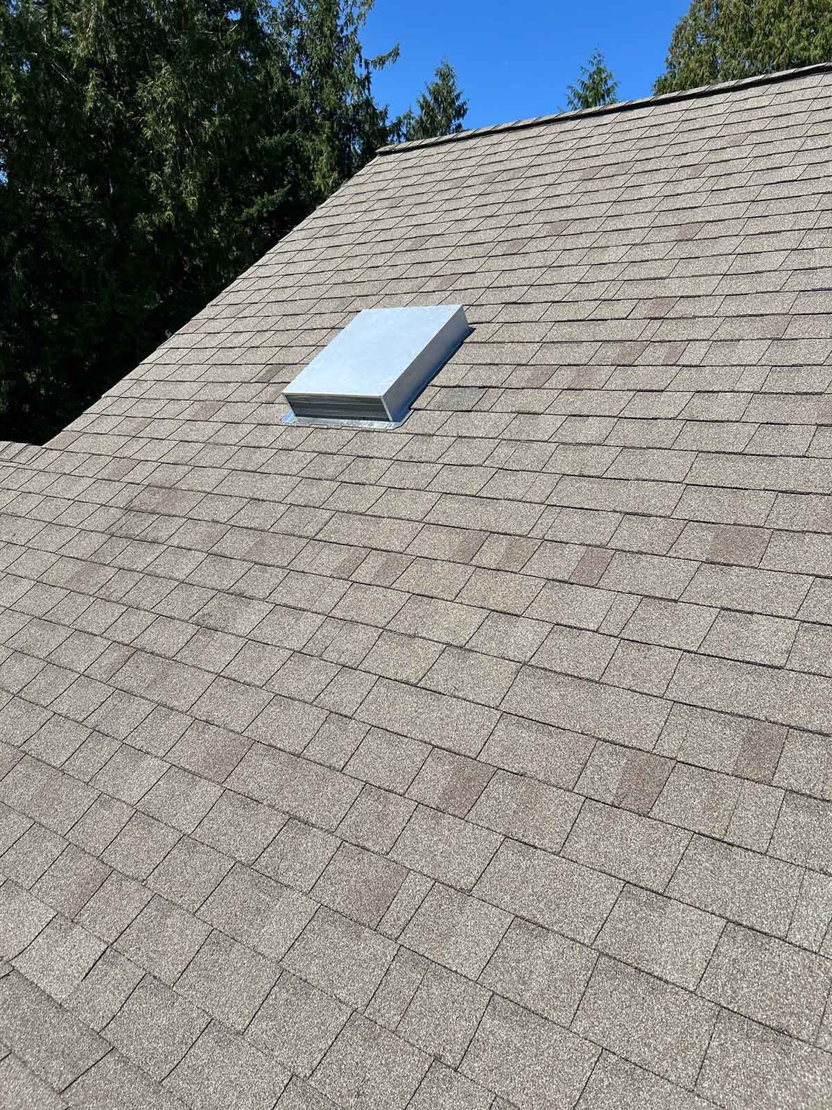 Installing an Attic Fan on a Roof of a residential home with Melby Electric in Washington