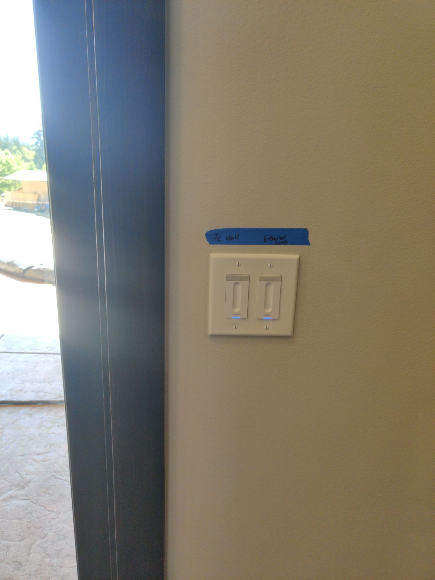 Two Old Light Sensors Replaced for a Home by Melby Electric